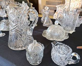 Cut glass bowls, stemware, dishes, butter dish, glasses, platter, pitchers