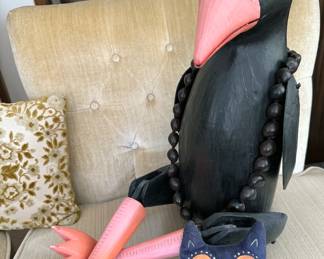 Assorted animal statues, mostly wooden