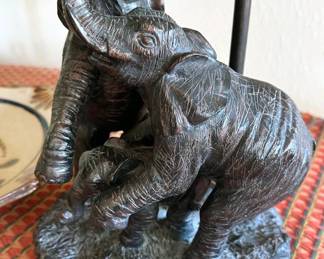 Assorted animal statues, mostly wooden