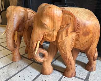 Assorted animal statues, mostly wooden