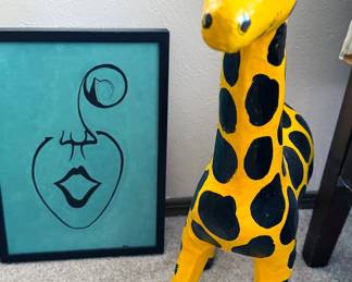 Assorted animal statues, mostly wooden