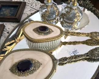 Ormolu vanity set: mirrored tray, perfume bottles, handheld mirror, brush