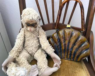 Milgrim lucite clamshell purse + vintage mohair monkey stuffed animal, possibly Schuco
