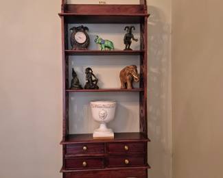 Pair of mahogany shelves with collectibles