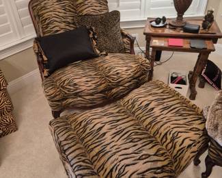 Pair of zebra armchairs with ottomans