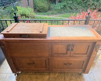 Handcrafted Solid Wood Outdoor Bar with marble top cutting board, built in cooler and water spicut. By Rustic Woodworx of North Atlanta