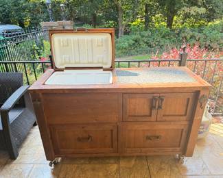 Handcrafted Solid Wood Outdoor Bar with marble top cutting board, built in cooler and water spicut. By Rustic Woodworx of North Atlanta