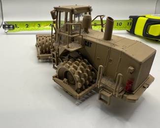 Norscot 1:50 scale diecast model of a Caterpillar 815F Military Soil Compactor