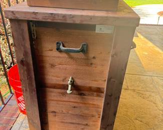 Handcrafted Solid Wood Outdoor Bar with marble top cutting board, built in cooler and water spicut. By Rustic Woodworx of North Atlanta
