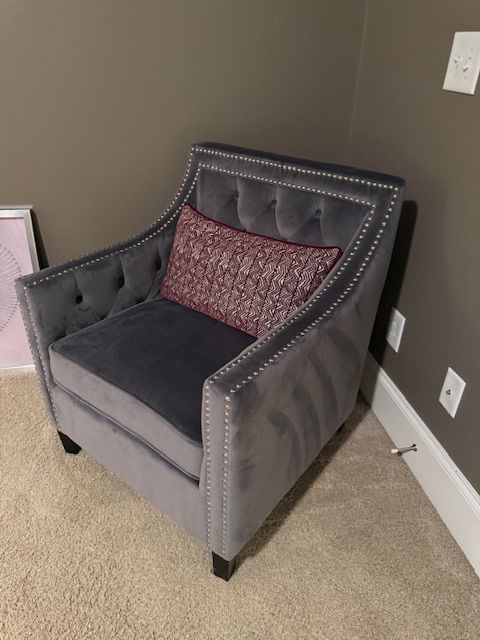 A pair of stunning club chairs