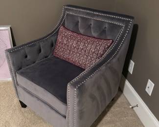 A pair of stunning club chairs