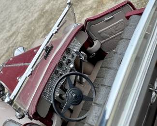 1930 Duesenberg “J” Derham Tourster from the Franklin mint 1/18 scale diecast model. original tag and removable hardtop.