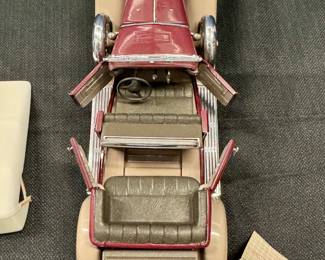 1930 Duesenberg “J” Derham Tourster from the Franklin mint 1/18 scale diecast model. original tag and removable hardtop.