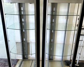Pair of Display Cabinets with some adjustable glass shelving.