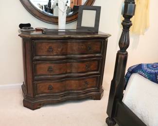 Hooker Beladora 3 drawer chest in a dark finish with inlaid accents. 