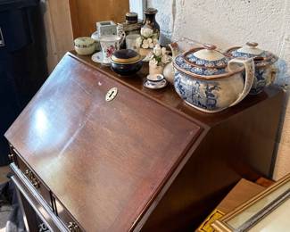 Walnut Ladies writing desk, repro
Fall front concealing fitted interior,
Sun bleaching
30 ½” high, 25” wide, 20 ¾” deep
Kittenger