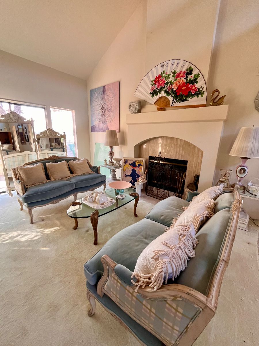 Louis XVI style French loveseats, tempered glass and brass coffee table & lots of other treasures