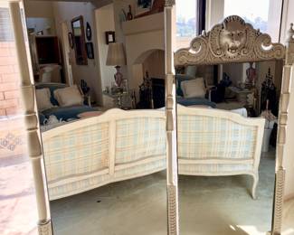 Ornate conjoined mirrors with claw feet