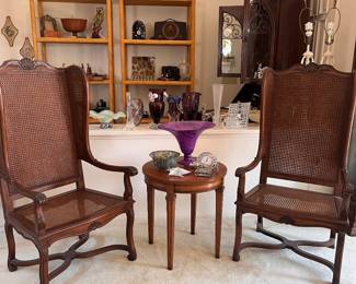 View of chairs without the cushions. They are either late Georgian period or Louis XIV revival, early 1900s.