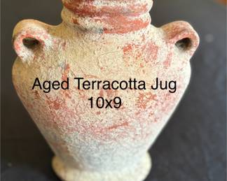 Aged terracotta jug