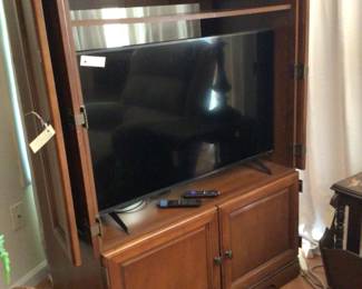 Entertainment center $95.; Vizio TV $85.
