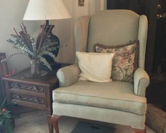Wingback chair $125.; end table $75.; lamps & decor