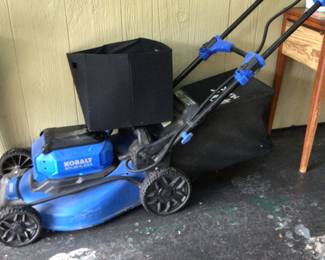 kobalt electric rechargeable lawnmower with battery $100.