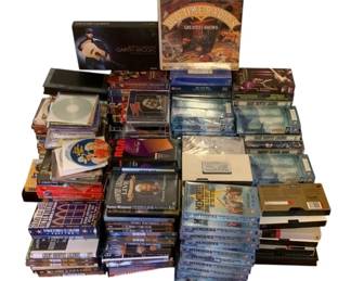 374 - Lot of Assorted DVDs & VHS Tapes
