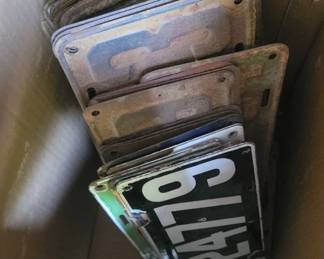 Around 50 vintage license plates. 1910 to present day
