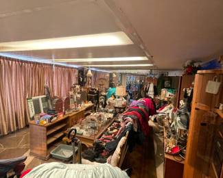 The room that has all the clothes and shoes