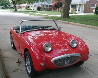 Fully restored 1961 Austin-Healey Bugeye Sprite, also known as the Frogeye Sprite in the UK, is a classic sports car known for its distinctive fixed headlights (resembling a "Bugeye" or "Frogeye"). It's a lightweight, compact roadster with a simple, functional design, and it was a popular entry-level sports car when new