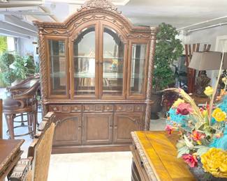 Beautiful matching dining hutch that separates into 2 pieces with removable glass shelving.