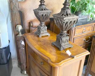 Those lamps are statement pieces featuring silk shades in a pretty taupe color.