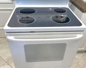 Like new smooth stove top and oven. Tested. Works. Nice.