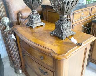 Also from the Ernest Hemingway Collection, this small dresser features a wood inly detail on the top. (Those lamps are statement pieces featuring silk shades in a pretty taupe color.)