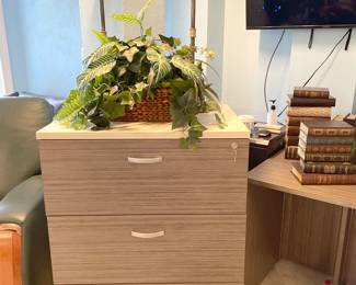 Tall and deep, three drawer filing cabinet matches the desk. Locks!