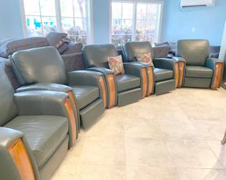 Home theatre seating priced really, really well. Five (5) forest green chairs (3 recline) all feature wooden cup holders on both sides. Actually, not that heavy, plus seats come apart into two pieces easily.