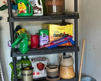 Shelf Full Of Lawn Care And Potting Supplies