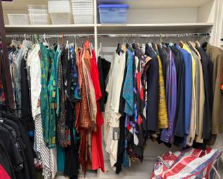 Lots and lots of women’s clothes, larger sizes, mostly 16-20 with some 12-14, some vintage clothing, lots of clothes from Asia, South America, Mexico, Africa and the Middle East, many bought on their myriad of travels, many are new with tags (never worn, at one point they were thinking of opening a store with imported ethnic and tribal clothing and purchased a lot of stock but never opened the store). There are 5 packed rails plus a huge walk in closet full of clothes.