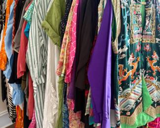 Lots and lots of women’s clothes, larger sizes, mostly 16-20 with some 12-14, some vintage clothing, lots of clothes from Asia, South America, Mexico, Africa and the Middle East, many bought on their myriad of travels, many are new with tags (never worn, at one point they were thinking of opening a store with imported ethnic and tribal clothing and purchased a lot of stock but never opened the store). There are 5 packed rails plus a huge walk in closet full of clothes.