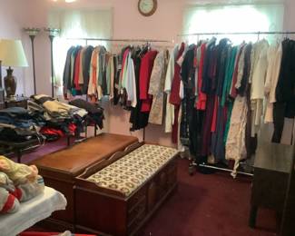 Lots of women’s vintage clothes: suits, pants, tops, dresses, sweaters