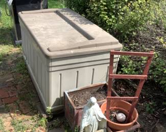 Rubbermaid storage box, pots, garden yard art