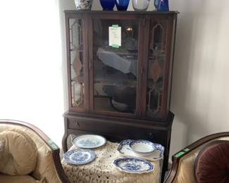 Assortment of blue vases and platters