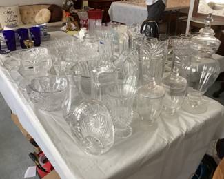 Multiple pieces of cut glass….bowls, vases, baskets