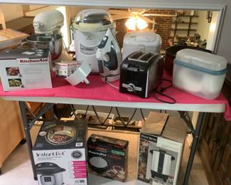 Kitchen electronic appliances.   Kitchen aide mixer and accessories, toaster, two hand mixers, ,brand new insta pot, coffee pot, iron, electric skillet