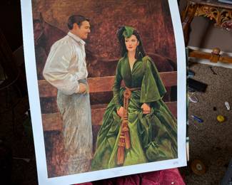 There is a frame and glass this print probably came out of at the house.