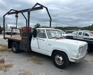 DODGE 3500 FLATBED CRANE TRUCK Title