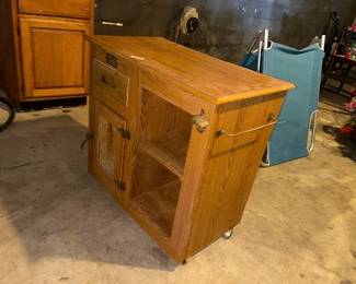 WOODEN CABINET ON WHEELS