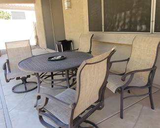 Mallin patio set . 4 rocker chairs