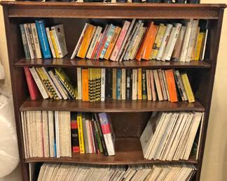 Auction Catalogues in a Mahogany Bookcase